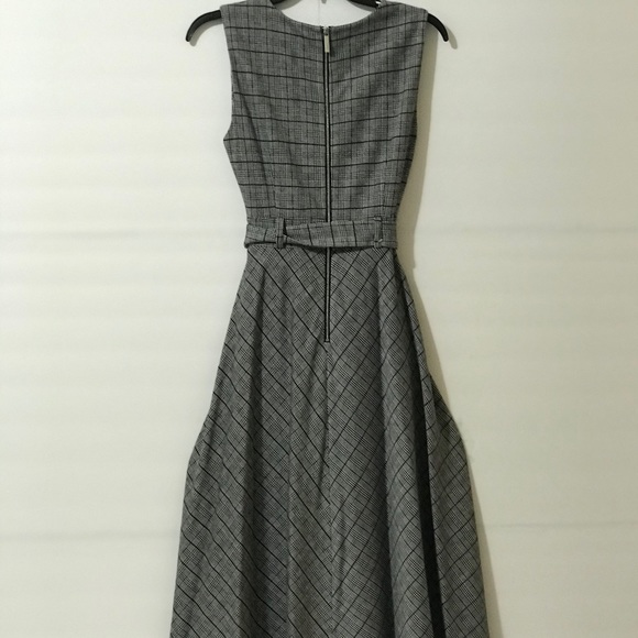 Calvin Klein
Belted Stretch Midi Dress - Picture 8 of 13